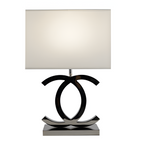 Poleret reflekterende bordlampe – skulpturel