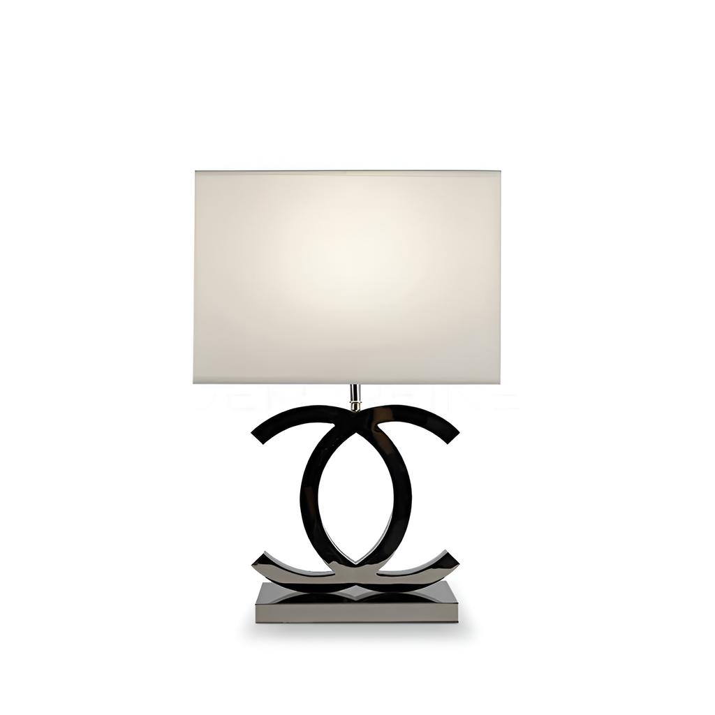 Poleret reflekterende bordlampe – skulpturel