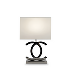 Poleret reflekterende bordlampe – skulpturel