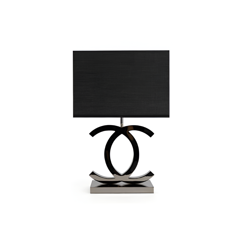 Poleret reflekterende bordlampe – skulpturel