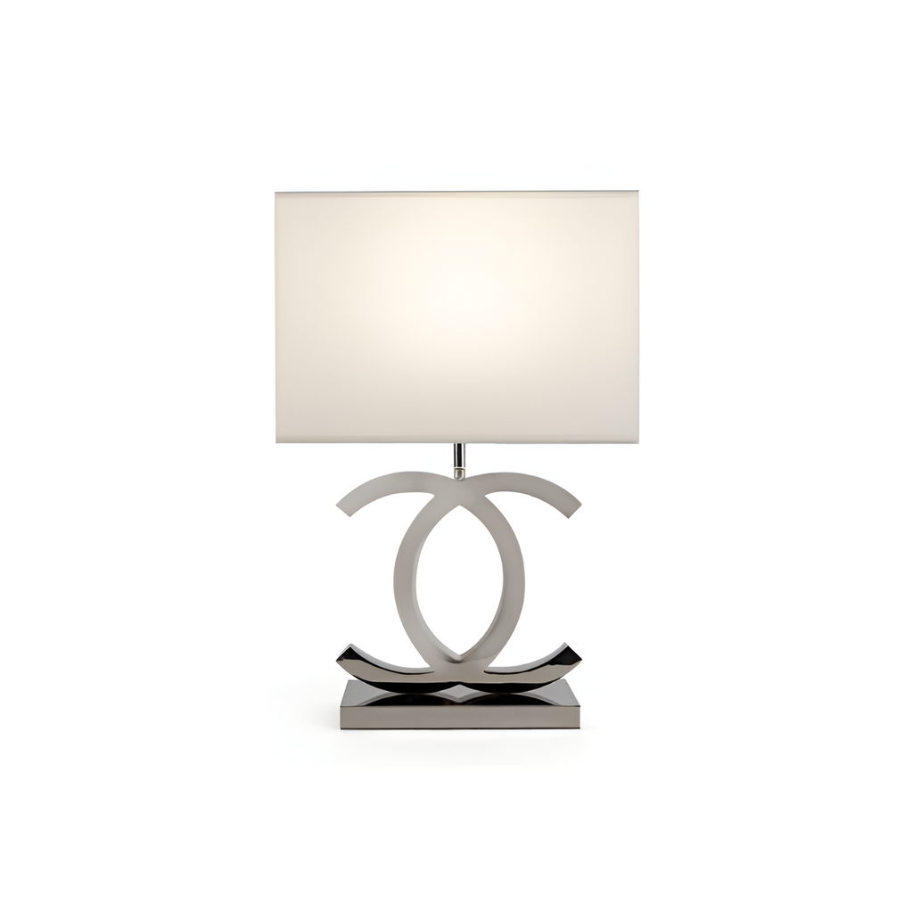 Poleret reflekterende bordlampe – skulpturel