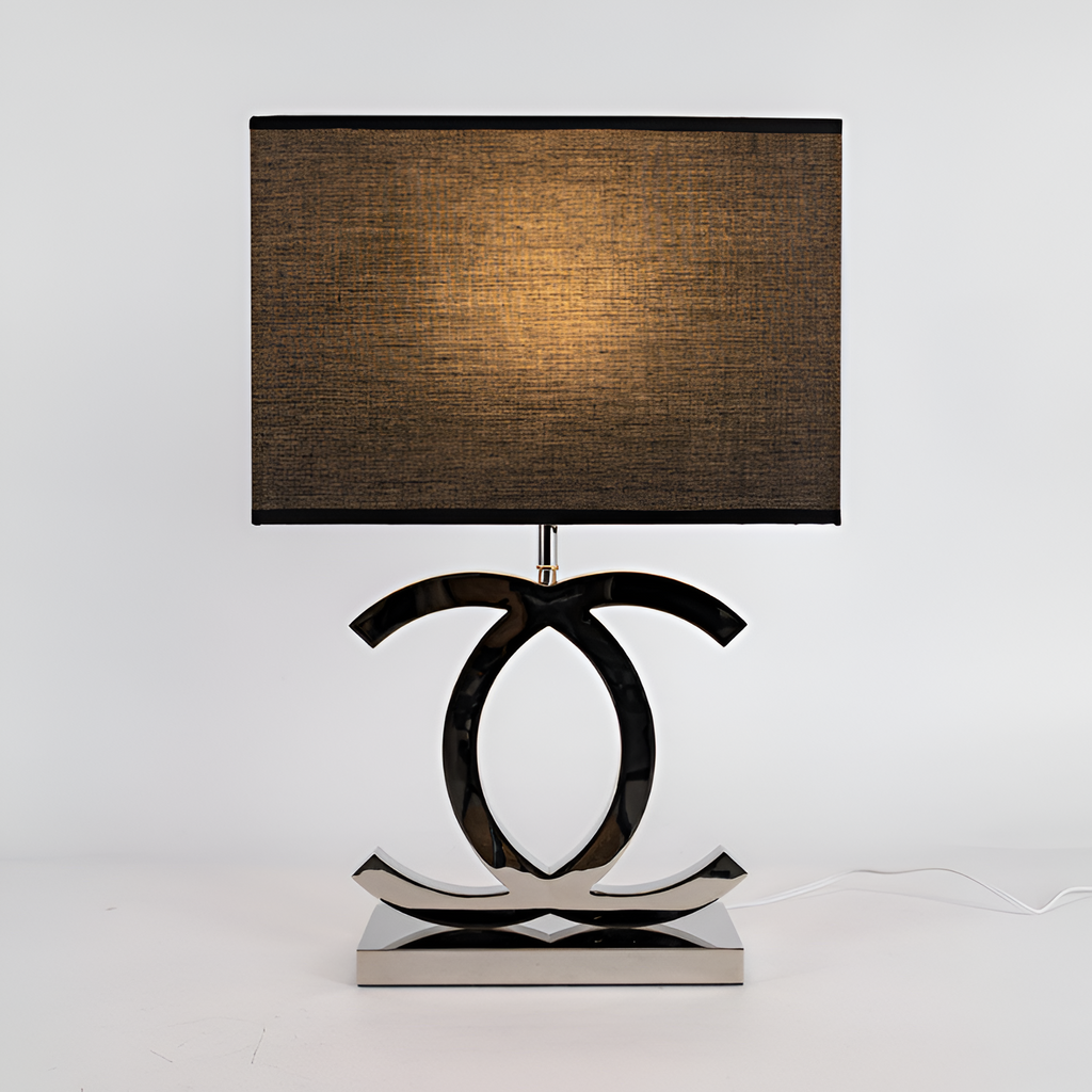 Poleret reflekterende bordlampe – skulpturel