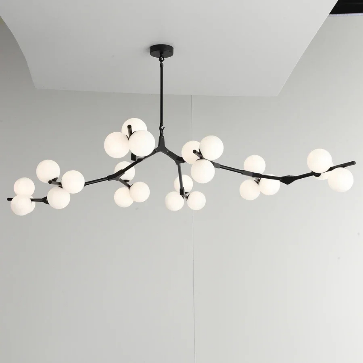 Moderne pendel med trægren-design