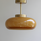 Loftlampe i gul messing med blank overflade – delvist indbygget