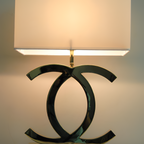 Poleret reflekterende bordlampe – skulpturel