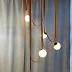 Italiensk-inspireret pendel med draperet design